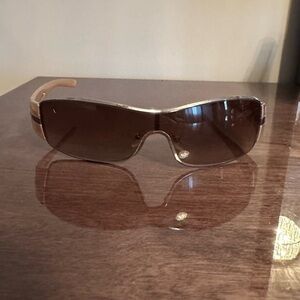 Prada Designer Sunglasses
Minor scratches, wide frame, chic early 2000s